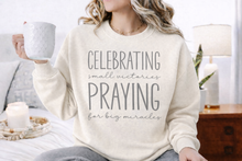 Load image into Gallery viewer, Celebrating Victories, Praying for Big Miracles Sweatshirt