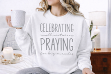 Load image into Gallery viewer, Celebrating Victories, Praying for Big Miracles Sweatshirt